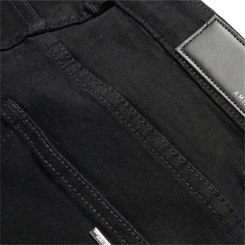 AMIRI - Jean à pointes brodées de diamants Splash Ink