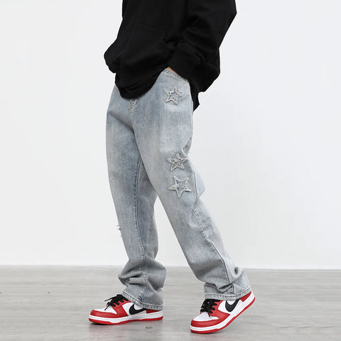 Jean homme coupe ample en micro corne brodée d'étoiles