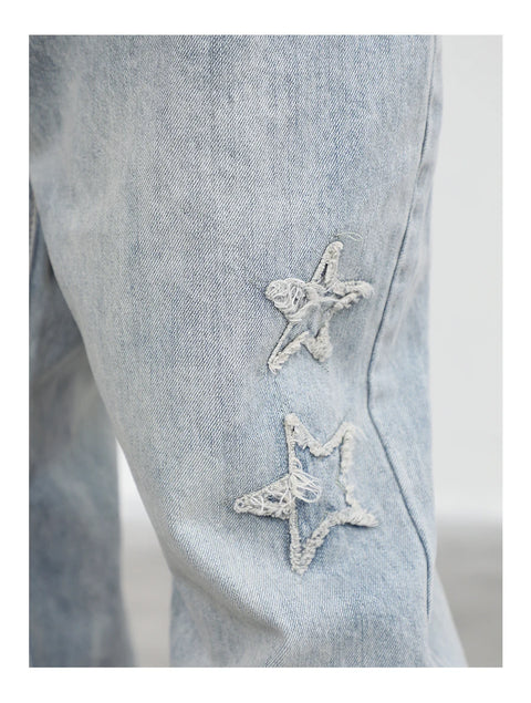 Jean homme coupe ample en micro corne brodée d'étoiles