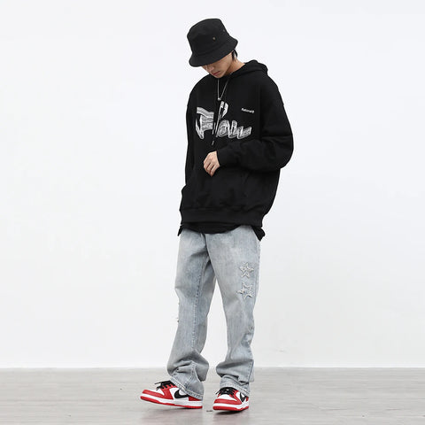 Jean homme coupe ample en micro corne brodée d'étoiles