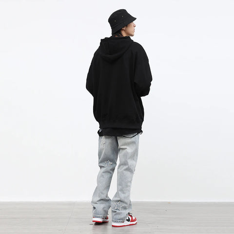 Jean homme coupe ample en micro corne brodée d'étoiles